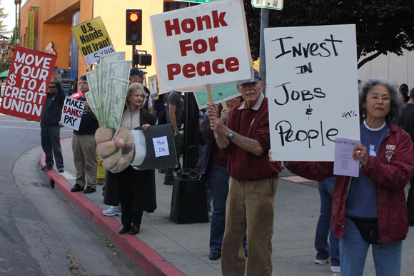 Crowd inciting traffic to honk