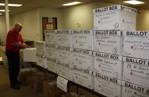 AAA worker opens ballot box