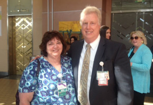 Pat Butcher, Supervising RN, celebrates NMC earning the coveted Level II trauma status with hospital CEO Harry Weis.