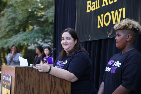 SEIU 521 Secretary Mulissa Willette MC'd the rally in Sacramento with her son by her side.